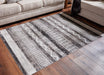 Henchester 5' x 7' Rug - Premium Rug from Ashley Furniture - Just $99.19! Shop now at Furniture Wholesale Plus  We are the best furniture store in Nashville, Hendersonville, Goodlettsville, Madison, Antioch, Mount Juliet, Lebanon, Gallatin, Springfield, Murfreesboro, Franklin, Brentwood