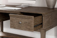 Janismore Home Office Storage Leg Desk - Premium Desk from Ashley Furniture - Just $579.20! Shop now at Furniture Wholesale Plus  We are the best furniture store in Nashville, Hendersonville, Goodlettsville, Madison, Antioch, Mount Juliet, Lebanon, Gallatin, Springfield, Murfreesboro, Franklin, Brentwood