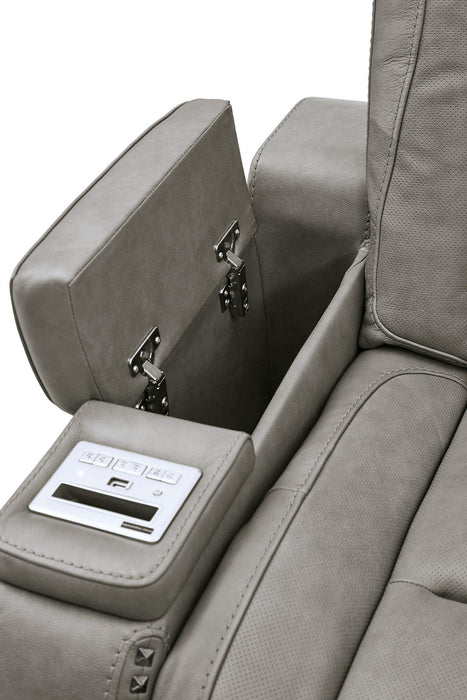 The Man-Den Power Reclining Loveseat with Console - Premium Loveseat from Ashley Furniture - Just $2152.97! Shop now at Furniture Wholesale Plus  We are the best furniture store in Nashville, Hendersonville, Goodlettsville, Madison, Antioch, Mount Juliet, Lebanon, Gallatin, Springfield, Murfreesboro, Franklin, Brentwood