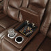 The Man-Den Power Reclining Loveseat with Console - Premium Loveseat from Ashley Furniture - Just $2152.97! Shop now at Furniture Wholesale Plus  We are the best furniture store in Nashville, Hendersonville, Goodlettsville, Madison, Antioch, Mount Juliet, Lebanon, Gallatin, Springfield, Murfreesboro, Franklin, Brentwood