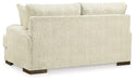 Caretti Loveseat - Premium Loveseat from Ashley Furniture - Just $660.55! Shop now at Furniture Wholesale Plus  We are the best furniture store in Nashville, Hendersonville, Goodlettsville, Madison, Antioch, Mount Juliet, Lebanon, Gallatin, Springfield, Murfreesboro, Franklin, Brentwood