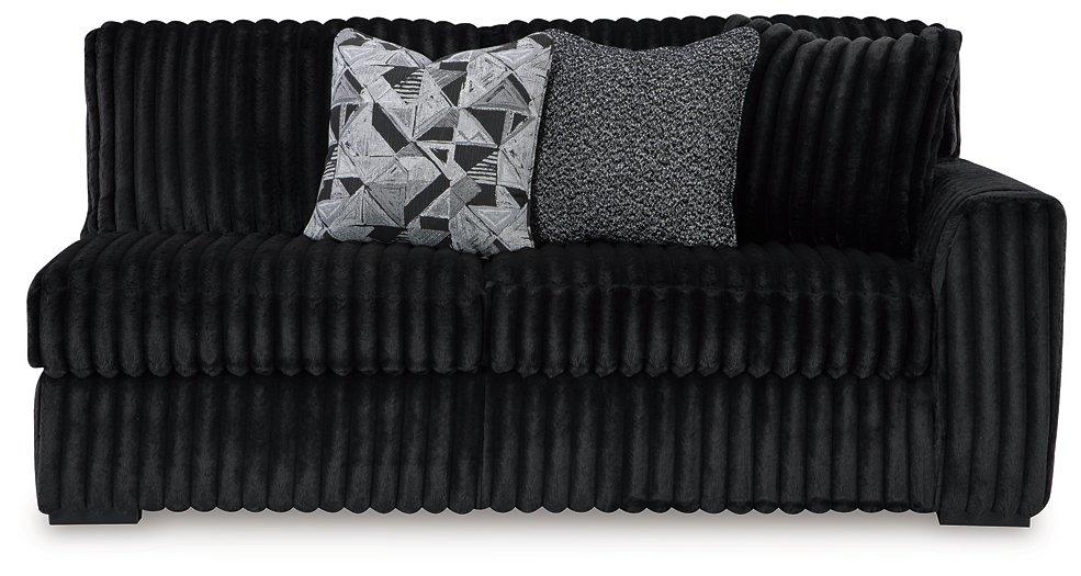 Midnight-Madness Sectional Sofa with Chaise - Premium Chofa from Ashley Furniture - Just $1188.84! Shop now at Furniture Wholesale Plus  We are the best furniture store in Nashville, Hendersonville, Goodlettsville, Madison, Antioch, Mount Juliet, Lebanon, Gallatin, Springfield, Murfreesboro, Franklin, Brentwood