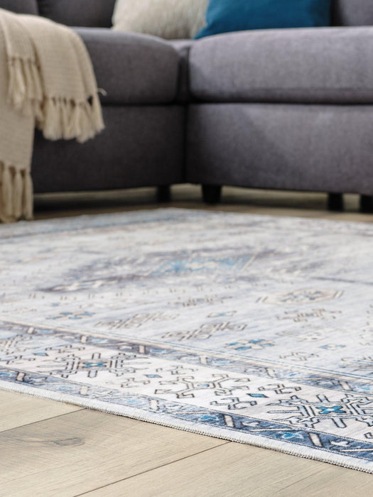 Hebruns 5' x 7' Rug - Premium Rug from Ashley Furniture - Just $92.13! Shop now at Furniture Wholesale Plus  We are the best furniture store in Nashville, Hendersonville, Goodlettsville, Madison, Antioch, Mount Juliet, Lebanon, Gallatin, Springfield, Murfreesboro, Franklin, Brentwood