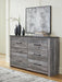 Bronyan Dresser - Premium Dresser from Ashley Furniture - Just $345.91! Shop now at Furniture Wholesale Plus  We are the best furniture store in Nashville, Hendersonville, Goodlettsville, Madison, Antioch, Mount Juliet, Lebanon, Gallatin, Springfield, Murfreesboro, Franklin, Brentwood