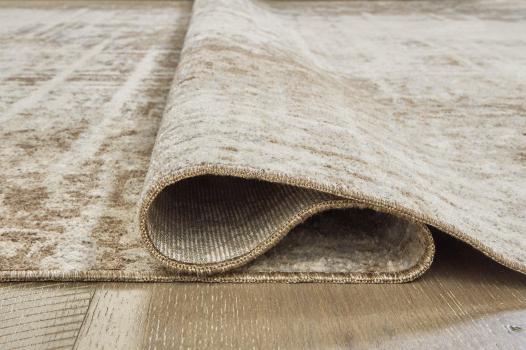 Grifflain 5' x 7' Rug - Premium Rug from Ashley Furniture - Just $90.36! Shop now at Furniture Wholesale Plus  We are the best furniture store in Nashville, Hendersonville, Goodlettsville, Madison, Antioch, Mount Juliet, Lebanon, Gallatin, Springfield, Murfreesboro, Franklin, Brentwood