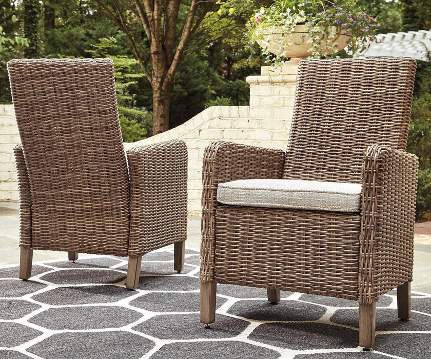 Beachcroft Outdoor Arm Chair with Cushion (Set of 2) - Premium Outdoor Dining Chair from Ashley Furniture - Just $770.66! Shop now at Furniture Wholesale Plus  We are the best furniture store in Nashville, Hendersonville, Goodlettsville, Madison, Antioch, Mount Juliet, Lebanon, Gallatin, Springfield, Murfreesboro, Franklin, Brentwood