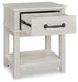 Dorrinson Nightstand - Premium Nightstand from Ashley Furniture - Just $131.31! Shop now at Furniture Wholesale Plus  We are the best furniture store in Nashville, Hendersonville, Goodlettsville, Madison, Antioch, Mount Juliet, Lebanon, Gallatin, Springfield, Murfreesboro, Franklin, Brentwood