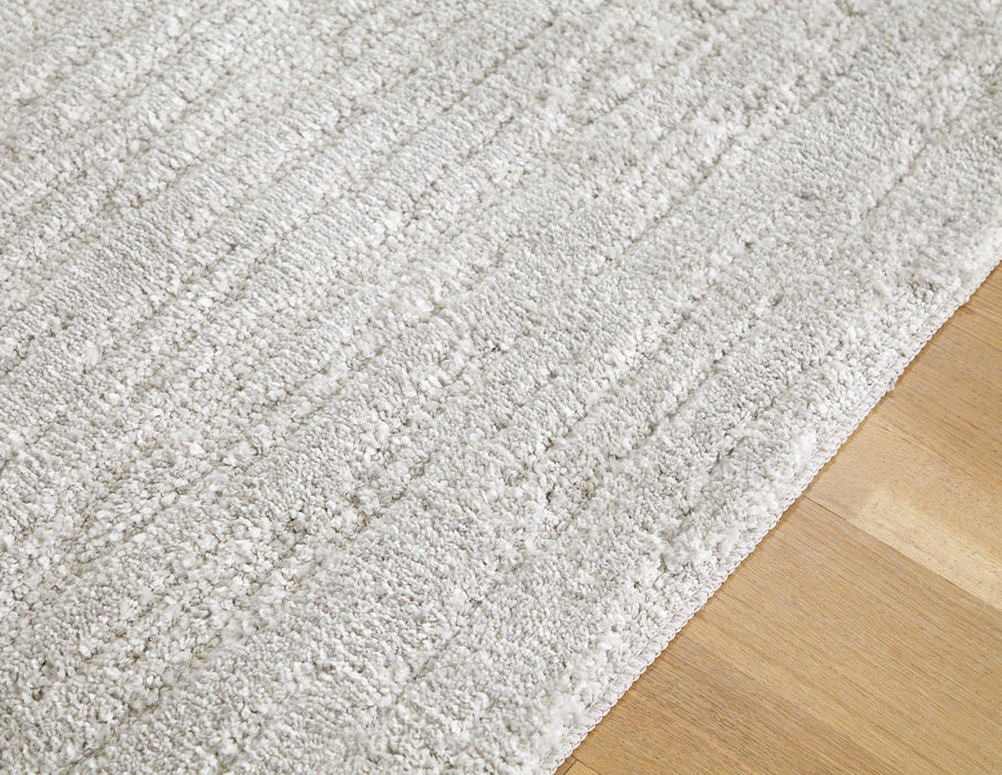 Ivygail 5' x 7' Rug - Premium Rug from Ashley Furniture - Just $85.07! Shop now at Furniture Wholesale Plus  We are the best furniture store in Nashville, Hendersonville, Goodlettsville, Madison, Antioch, Mount Juliet, Lebanon, Gallatin, Springfield, Murfreesboro, Franklin, Brentwood