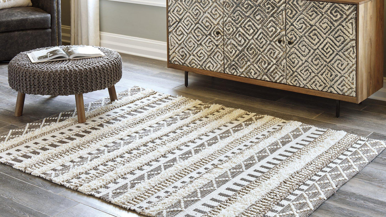 Karalee 5' x 7' Rug - Premium Rug from Ashley Furniture - Just $238.66! Shop now at Furniture Wholesale Plus  We are the best furniture store in Nashville, Hendersonville, Goodlettsville, Madison, Antioch, Mount Juliet, Lebanon, Gallatin, Springfield, Murfreesboro, Franklin, Brentwood