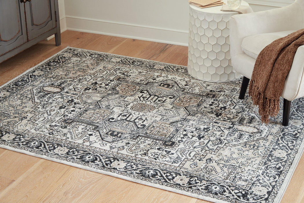 Gregmoore 5'2" x 6'10" Rug - Premium Rug from Ashley Furniture - Just $92.13! Shop now at Furniture Wholesale Plus  We are the best furniture store in Nashville, Hendersonville, Goodlettsville, Madison, Antioch, Mount Juliet, Lebanon, Gallatin, Springfield, Murfreesboro, Franklin, Brentwood