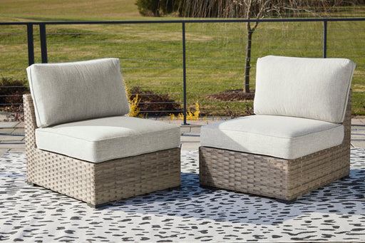 Calworth Outdoor Armless Chair with Cushion (Set of 2) - Premium Outdoor Seating from Ashley Furniture - Just $345.20! Shop now at Furniture Wholesale Plus  We are the best furniture store in Nashville, Hendersonville, Goodlettsville, Madison, Antioch, Mount Juliet, Lebanon, Gallatin, Springfield, Murfreesboro, Franklin, Brentwood