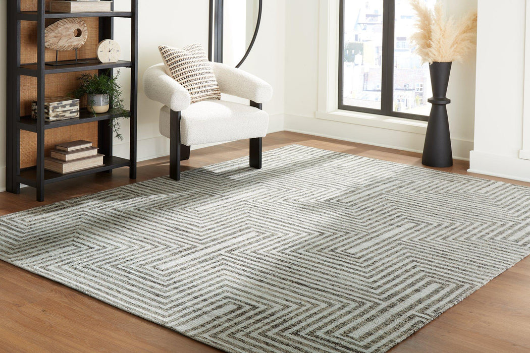 Jossen Rug - Premium Rug Medium from Ashley Furniture - Just $175.10! Shop now at Furniture Wholesale Plus  We are the best furniture store in Nashville, Hendersonville, Goodlettsville, Madison, Antioch, Mount Juliet, Lebanon, Gallatin, Springfield, Murfreesboro, Franklin, Brentwood