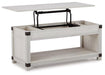 Bayflynn Lift-Top Coffee Table - Premium Cocktail Table Lift from Ashley Furniture - Just $189.12! Shop now at Furniture Wholesale Plus  We are the best furniture store in Nashville, Hendersonville, Goodlettsville, Madison, Antioch, Mount Juliet, Lebanon, Gallatin, Springfield, Murfreesboro, Franklin, Brentwood