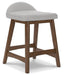 Lyncott Counter Height Bar Stool - Premium Barstool from Ashley Furniture - Just $92.51! Shop now at Furniture Wholesale Plus  We are the best furniture store in Nashville, Hendersonville, Goodlettsville, Madison, Antioch, Mount Juliet, Lebanon, Gallatin, Springfield, Murfreesboro, Franklin, Brentwood