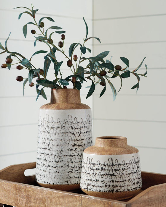 Meghan Vase (Set of 2) - Premium Vase from Ashley Furniture - Just $79.66! Shop now at Furniture Wholesale Plus  We are the best furniture store in Nashville, Hendersonville, Goodlettsville, Madison, Antioch, Mount Juliet, Lebanon, Gallatin, Springfield, Murfreesboro, Franklin, Brentwood