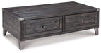 Todoe Coffee Table with Lift Top - Premium Cocktail Table Lift from Ashley Furniture - Just $515.72! Shop now at Furniture Wholesale Plus  We are the best furniture store in Nashville, Hendersonville, Goodlettsville, Madison, Antioch, Mount Juliet, Lebanon, Gallatin, Springfield, Murfreesboro, Franklin, Brentwood