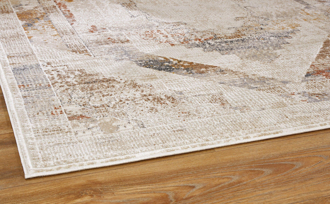 Varnwood Rug - Premium Rug Medium from Ashley Furniture - Just $111.55! Shop now at Furniture Wholesale Plus  We are the best furniture store in Nashville, Hendersonville, Goodlettsville, Madison, Antioch, Mount Juliet, Lebanon, Gallatin, Springfield, Murfreesboro, Franklin, Brentwood