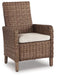 Beachcroft Arm Chair with Cushion (Set of 2) - Premium Outdoor Dining Chair from Ashley Furniture - Just $770.66! Shop now at Furniture Wholesale Plus  We are the best furniture store in Nashville, Hendersonville, Goodlettsville, Madison, Antioch, Mount Juliet, Lebanon, Gallatin, Springfield, Murfreesboro, Franklin, Brentwood