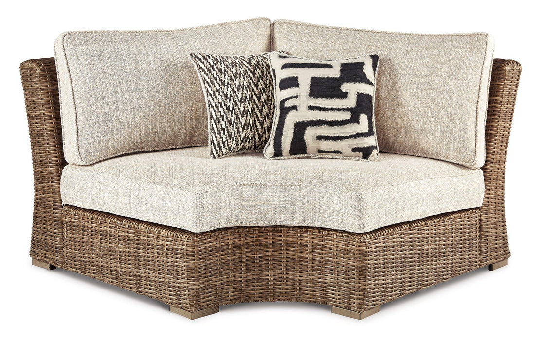 Beachcroft Curved Corner Chair with Cushion - Premium Outdoor Seating from Ashley Furniture - Just $1016.05! Shop now at Furniture Wholesale Plus  We are the best furniture store in Nashville, Hendersonville, Goodlettsville, Madison, Antioch, Mount Juliet, Lebanon, Gallatin, Springfield, Murfreesboro, Franklin, Brentwood