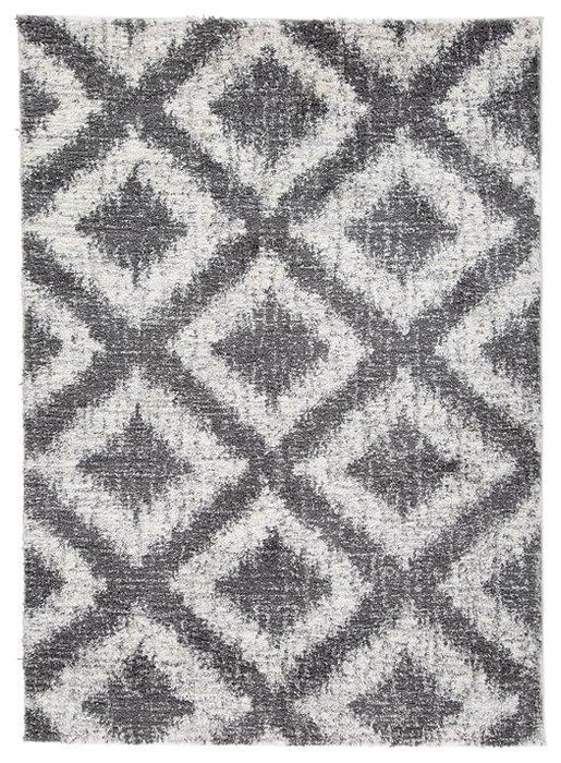 Junette 5'3" x 7'3" Rug - Premium Rug from Ashley Furniture - Just $102.72! Shop now at Furniture Wholesale Plus  We are the best furniture store in Nashville, Hendersonville, Goodlettsville, Madison, Antioch, Mount Juliet, Lebanon, Gallatin, Springfield, Murfreesboro, Franklin, Brentwood