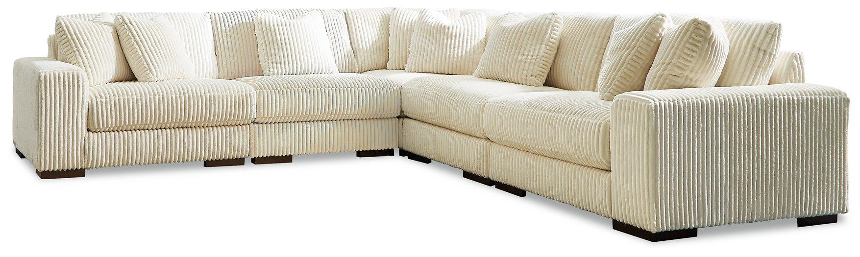 Lindyn Sectional - Premium Sectional from Ashley Furniture - Just $2050.21! Shop now at Furniture Wholesale Plus  We are the best furniture store in Nashville, Hendersonville, Goodlettsville, Madison, Antioch, Mount Juliet, Lebanon, Gallatin, Springfield, Murfreesboro, Franklin, Brentwood