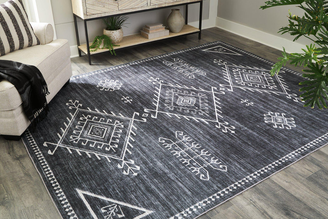 Arloman Rug - Premium Rug from Ashley Furniture - Just $134.50! Shop now at Furniture Wholesale Plus  We are the best furniture store in Nashville, Hendersonville, Goodlettsville, Madison, Antioch, Mount Juliet, Lebanon, Gallatin, Springfield, Murfreesboro, Franklin, Brentwood