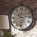 Augustina Wall Clock - Premium Clock from Ashley Furniture - Just $146.86! Shop now at Furniture Wholesale Plus  We are the best furniture store in Nashville, Hendersonville, Goodlettsville, Madison, Antioch, Mount Juliet, Lebanon, Gallatin, Springfield, Murfreesboro, Franklin, Brentwood