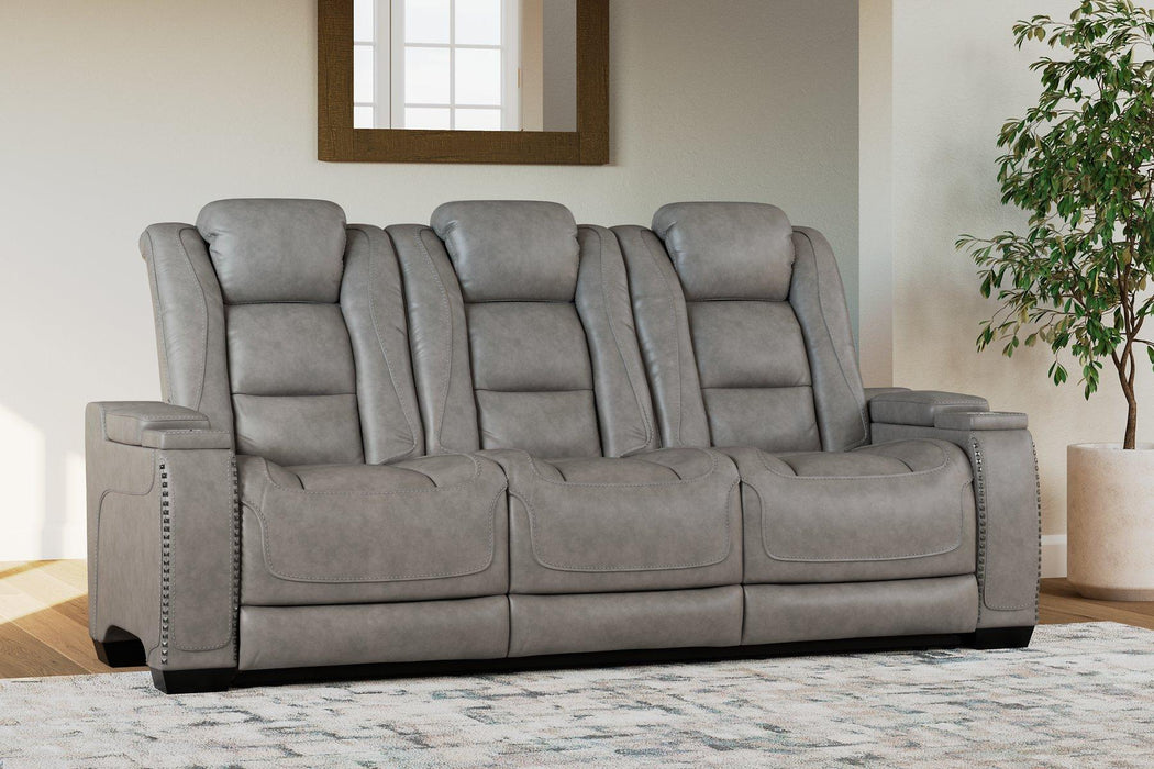 The Man-Den Power Reclining Sofa - Premium Sofa from Ashley Furniture - Just $2183.45! Shop now at Furniture Wholesale Plus  We are the best furniture store in Nashville, Hendersonville, Goodlettsville, Madison, Antioch, Mount Juliet, Lebanon, Gallatin, Springfield, Murfreesboro, Franklin, Brentwood