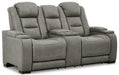 The Man-Den Power Reclining Loveseat with Console - Premium Loveseat from Ashley Furniture - Just $2152.97! Shop now at Furniture Wholesale Plus  We are the best furniture store in Nashville, Hendersonville, Goodlettsville, Madison, Antioch, Mount Juliet, Lebanon, Gallatin, Springfield, Murfreesboro, Franklin, Brentwood