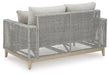 Seton Creek Outdoor Loveseat with Cushion - Premium Outdoor Seating from Ashley Furniture - Just $1016.05! Shop now at Furniture Wholesale Plus  We are the best furniture store in Nashville, Hendersonville, Goodlettsville, Madison, Antioch, Mount Juliet, Lebanon, Gallatin, Springfield, Murfreesboro, Franklin, Brentwood