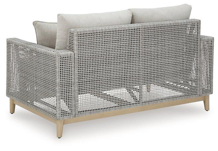 Seton Creek Outdoor Loveseat with Cushion - Premium Outdoor Seating from Ashley Furniture - Just $1016.05! Shop now at Furniture Wholesale Plus  We are the best furniture store in Nashville, Hendersonville, Goodlettsville, Madison, Antioch, Mount Juliet, Lebanon, Gallatin, Springfield, Murfreesboro, Franklin, Brentwood