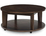 Korestone 2 Coffee Table - Premium Cocktail Table from Ashley Furniture - Just $280.92! Shop now at Furniture Wholesale Plus  We are the best furniture store in Nashville, Hendersonville, Goodlettsville, Madison, Antioch, Mount Juliet, Lebanon, Gallatin, Springfield, Murfreesboro, Franklin, Brentwood