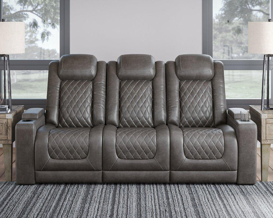 HyllMont Power Reclining Sofa - Premium Sofa from Ashley Furniture - Just $1364.31! Shop now at Furniture Wholesale Plus  We are the best furniture store in Nashville, Hendersonville, Goodlettsville, Madison, Antioch, Mount Juliet, Lebanon, Gallatin, Springfield, Murfreesboro, Franklin, Brentwood