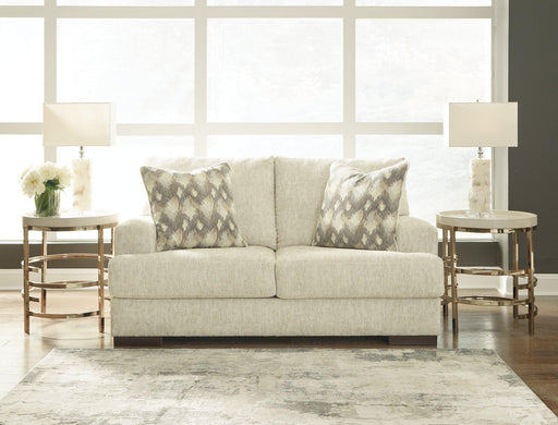 Caretti Loveseat - Premium Loveseat from Ashley Furniture - Just $660.55! Shop now at Furniture Wholesale Plus  We are the best furniture store in Nashville, Hendersonville, Goodlettsville, Madison, Antioch, Mount Juliet, Lebanon, Gallatin, Springfield, Murfreesboro, Franklin, Brentwood