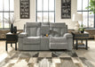 Mitchiner Reclining Loveseat with Console - Premium Loveseat from Ashley Furniture - Just $825.39! Shop now at Furniture Wholesale Plus  We are the best furniture store in Nashville, Hendersonville, Goodlettsville, Madison, Antioch, Mount Juliet, Lebanon, Gallatin, Springfield, Murfreesboro, Franklin, Brentwood