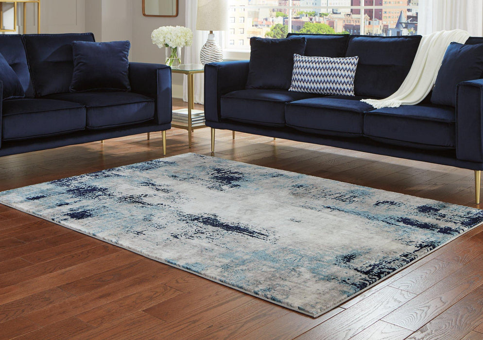 Leonelle 5'3" x 7'3" Rug - Premium Rug from Ashley Furniture - Just $120.37! Shop now at Furniture Wholesale Plus  We are the best furniture store in Nashville, Hendersonville, Goodlettsville, Madison, Antioch, Mount Juliet, Lebanon, Gallatin, Springfield, Murfreesboro, Franklin, Brentwood