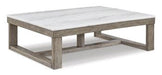 Loyaska Coffee Table - Premium Cocktail Table from Ashley Furniture - Just $480.41! Shop now at Furniture Wholesale Plus  We are the best furniture store in Nashville, Hendersonville, Goodlettsville, Madison, Antioch, Mount Juliet, Lebanon, Gallatin, Springfield, Murfreesboro, Franklin, Brentwood