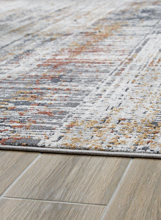 Rhettner 5'3" x 7'3" Rug - Premium Rug from Ashley Furniture - Just $187.46! Shop now at Furniture Wholesale Plus  We are the best furniture store in Nashville, Hendersonville, Goodlettsville, Madison, Antioch, Mount Juliet, Lebanon, Gallatin, Springfield, Murfreesboro, Franklin, Brentwood