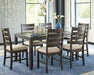 Rokane Dining Table and Chairs (Set of 7) - Premium Dining Table from Ashley Furniture - Just $663.66! Shop now at Furniture Wholesale Plus  We are the best furniture store in Nashville, Hendersonville, Goodlettsville, Madison, Antioch, Mount Juliet, Lebanon, Gallatin, Springfield, Murfreesboro, Franklin, Brentwood