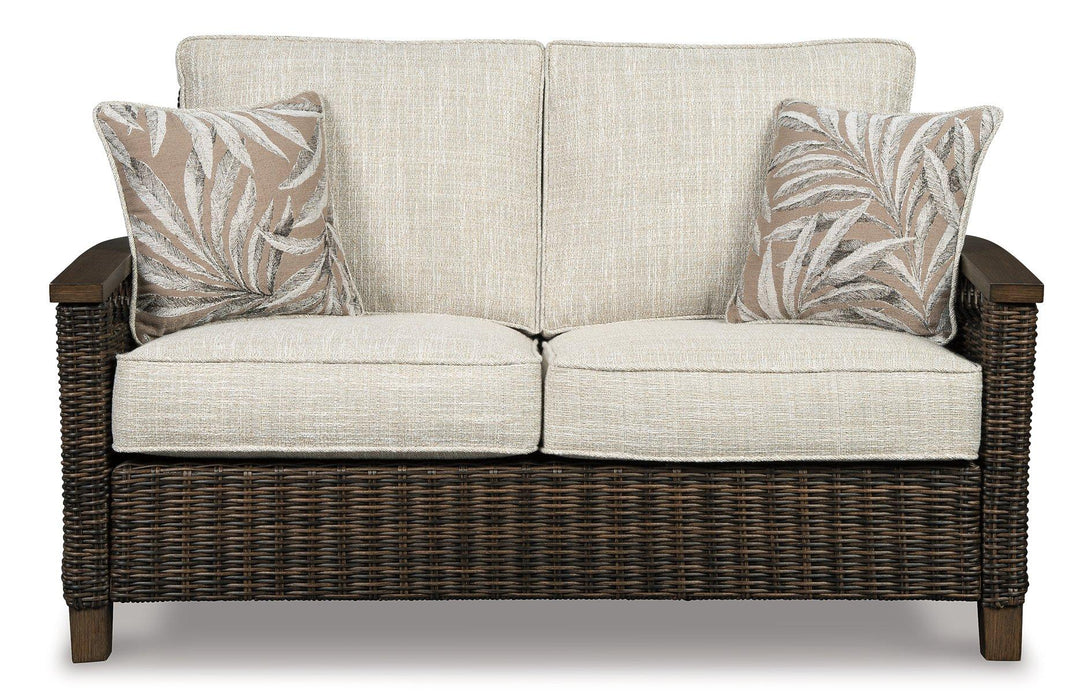 Paradise Trail Loveseat with Cushion - Premium Outdoor Seating from Ashley Furniture - Just $1007.22! Shop now at Furniture Wholesale Plus  We are the best furniture store in Nashville, Hendersonville, Goodlettsville, Madison, Antioch, Mount Juliet, Lebanon, Gallatin, Springfield, Murfreesboro, Franklin, Brentwood