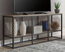 Wadeworth 65" TV Stand - Premium TV Stand from Ashley Furniture - Just $230.74! Shop now at Furniture Wholesale Plus  We are the best furniture store in Nashville, Hendersonville, Goodlettsville, Madison, Antioch, Mount Juliet, Lebanon, Gallatin, Springfield, Murfreesboro, Franklin, Brentwood