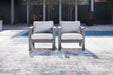 Amora Outdoor Lounge Chair with Cushion (Set of 2) - Premium Outdoor Seating from Ashley Furniture - Just $788.31! Shop now at Furniture Wholesale Plus  We are the best furniture store in Nashville, Hendersonville, Goodlettsville, Madison, Antioch, Mount Juliet, Lebanon, Gallatin, Springfield, Murfreesboro, Franklin, Brentwood