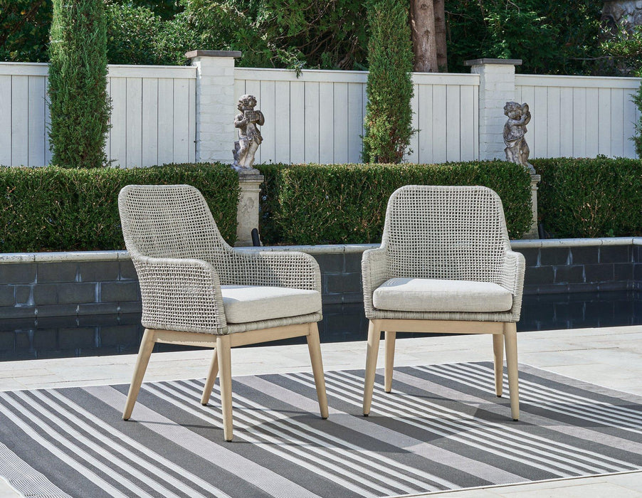 Seton Creek Outdoor Dining Arm Chair (Set of 2) - Premium Outdoor Dining Chair from Ashley Furniture - Just $559.09! Shop now at Furniture Wholesale Plus  We are the best furniture store in Nashville, Hendersonville, Goodlettsville, Madison, Antioch, Mount Juliet, Lebanon, Gallatin, Springfield, Murfreesboro, Franklin, Brentwood