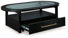 Winbardi Coffee Table - Premium Cocktail Table from Ashley Furniture - Just $333.88! Shop now at Furniture Wholesale Plus  We are the best furniture store in Nashville, Hendersonville, Goodlettsville, Madison, Antioch, Mount Juliet, Lebanon, Gallatin, Springfield, Murfreesboro, Franklin, Brentwood