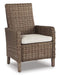 Beachcroft Arm Chair with Cushion (Set of 2) - Premium Outdoor Dining Chair from Ashley Furniture - Just $770.66! Shop now at Furniture Wholesale Plus  We are the best furniture store in Nashville, Hendersonville, Goodlettsville, Madison, Antioch, Mount Juliet, Lebanon, Gallatin, Springfield, Murfreesboro, Franklin, Brentwood