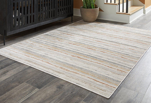 Artney Rug - Premium Rug Medium from Ashley Furniture - Just $111.55! Shop now at Furniture Wholesale Plus  We are the best furniture store in Nashville, Hendersonville, Goodlettsville, Madison, Antioch, Mount Juliet, Lebanon, Gallatin, Springfield, Murfreesboro, Franklin, Brentwood