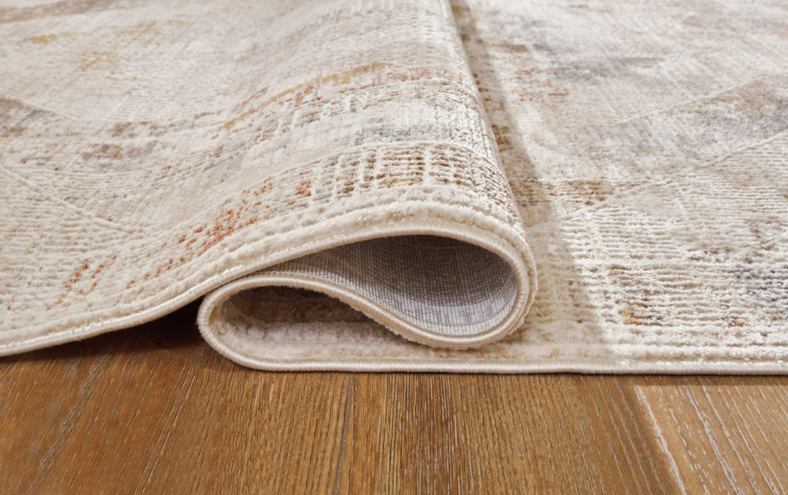 Varnwood Rug - Premium Rug Medium from Ashley Furniture - Just $111.55! Shop now at Furniture Wholesale Plus  We are the best furniture store in Nashville, Hendersonville, Goodlettsville, Madison, Antioch, Mount Juliet, Lebanon, Gallatin, Springfield, Murfreesboro, Franklin, Brentwood