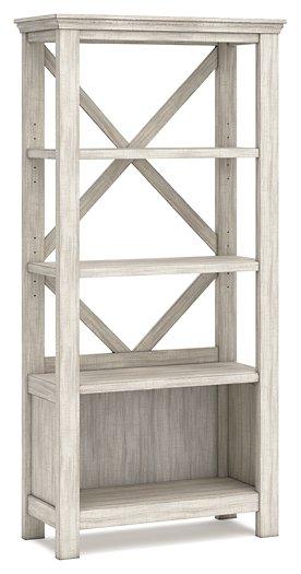 Carynhurst 75" Bookcase - Premium Bookcase from Ashley Furniture - Just $414.29! Shop now at Furniture Wholesale Plus  We are the best furniture store in Nashville, Hendersonville, Goodlettsville, Madison, Antioch, Mount Juliet, Lebanon, Gallatin, Springfield, Murfreesboro, Franklin, Brentwood