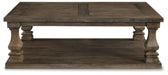 Johnelle Coffee Table - Premium Cocktail Table from Ashley Furniture - Just $408.03! Shop now at Furniture Wholesale Plus  We are the best furniture store in Nashville, Hendersonville, Goodlettsville, Madison, Antioch, Mount Juliet, Lebanon, Gallatin, Springfield, Murfreesboro, Franklin, Brentwood