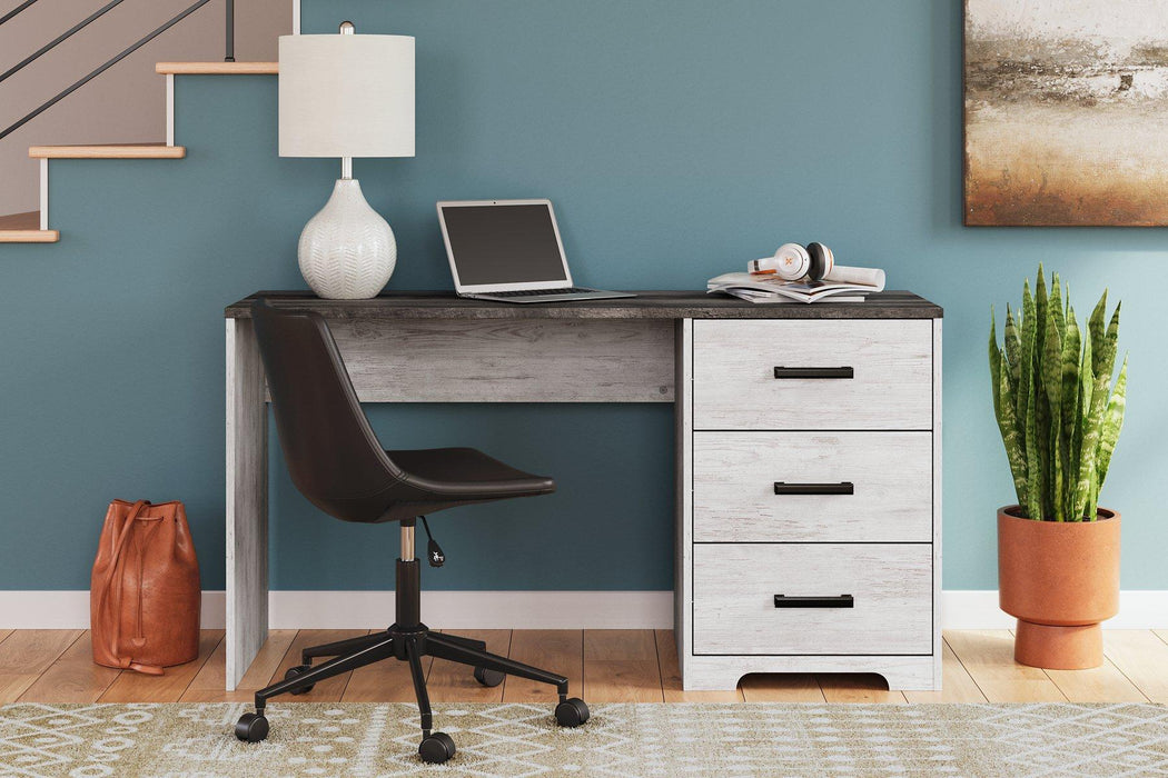 Shawburn 54" Home Office Desk - Premium Desk from Ashley Furniture - Just $176.01! Shop now at Furniture Wholesale Plus  We are the best furniture store in Nashville, Hendersonville, Goodlettsville, Madison, Antioch, Mount Juliet, Lebanon, Gallatin, Springfield, Murfreesboro, Franklin, Brentwood